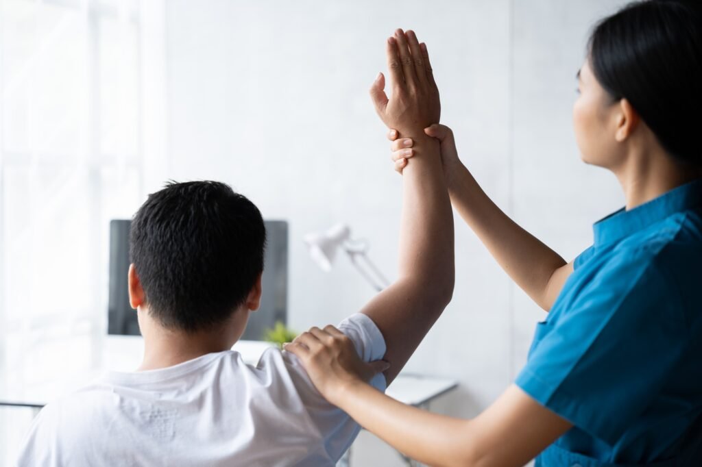 Physical therapy concept, Asian man is admitted to physiotherapy in a hospital.